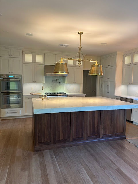 A custom kitchen island and new cabinetry installed by R&J Handyman Services LLC in Warwick, RI.