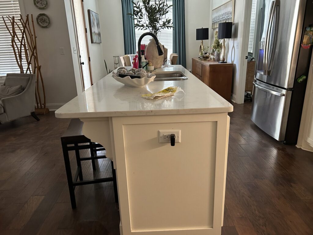 A finished kitchen island with electrical outlets installed by BK's Handyman Services in Carlton, OR.