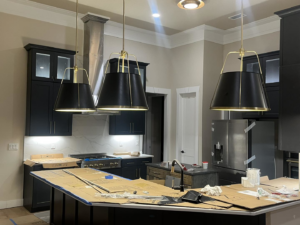 New pendant lights installed over a kitchen island by BGI Electric in Pensacola, FL