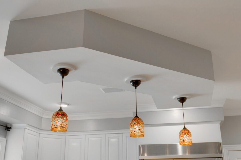 Beautiful decorative pendant lights professionally installed in a modern kitchen by MorLite Electric in Newport News, VA.
