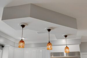 Beautiful decorative pendant lights professionally installed in a modern kitchen by MorLite Electric in Newport News, VA.