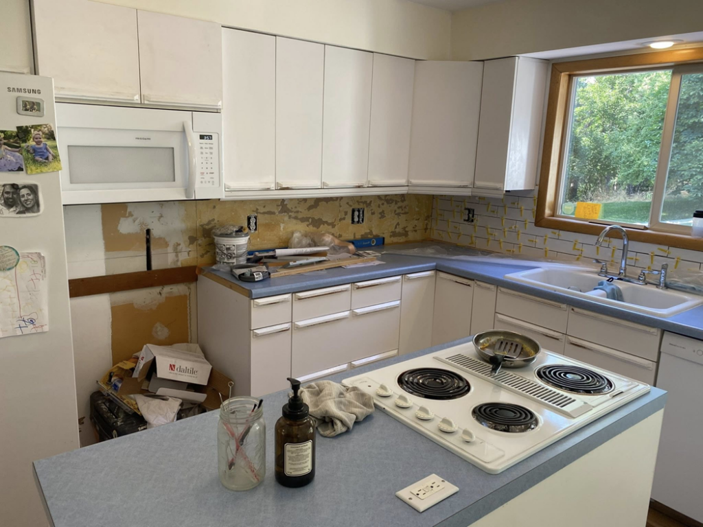 Kitchen renovation showing backsplash removal and exposed walls by Berg Handyman Services in Post Falls, ID
