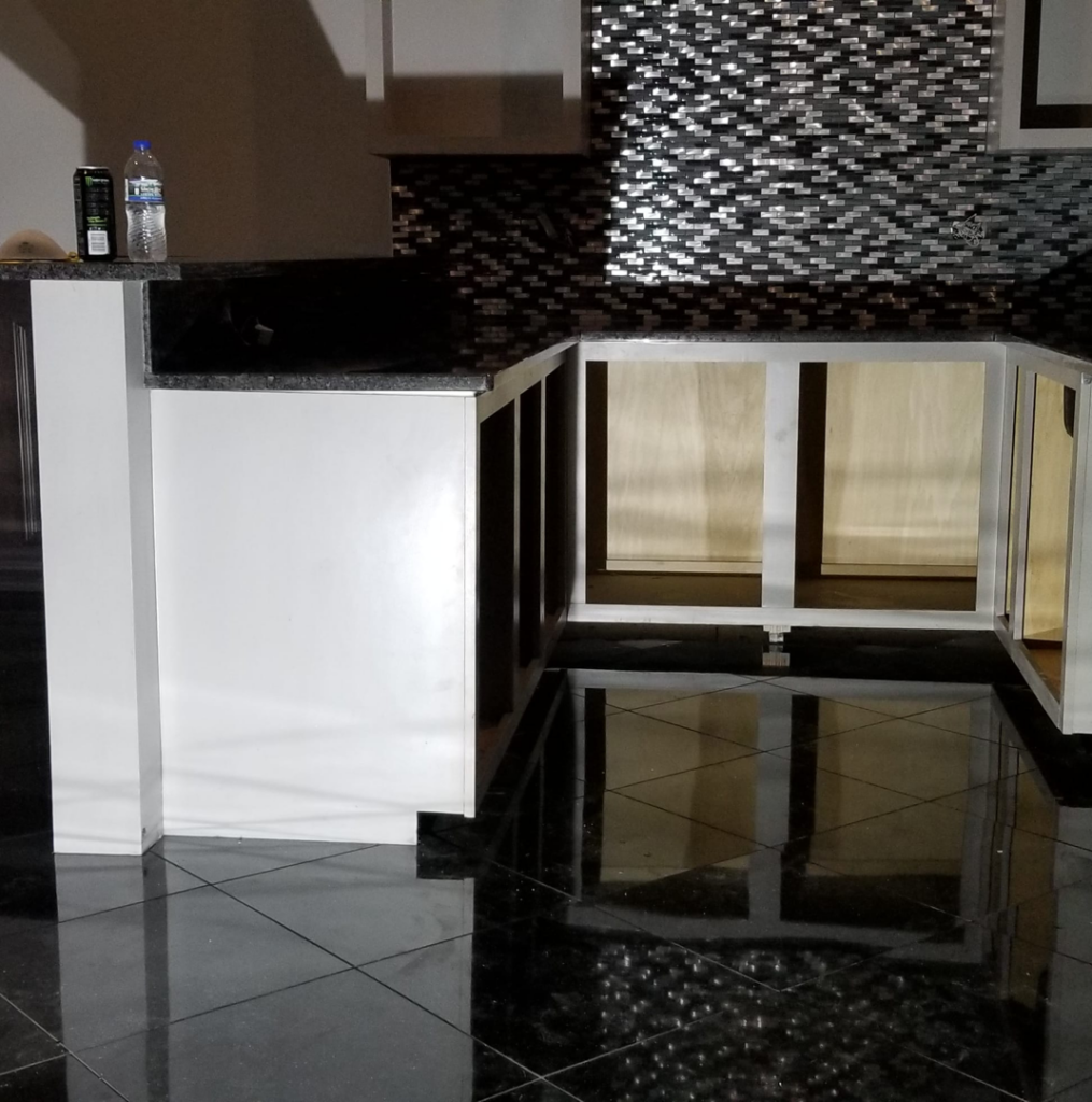 A kitchen renovation project in progress with new cabinets and backsplash tiling by Tile Works inc in Naperville, IL.