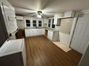 Kitchen renovation in progress with new cabinets, flooring, and appliances by NS Construction in Imperial, CA.