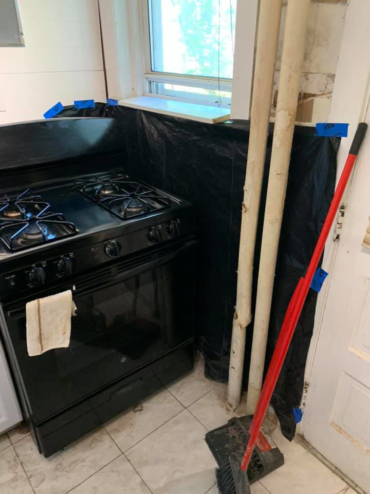 Kitchen renovation preparation with protective sheeting and tools by Tawfiq Services LLC in Philadelphia, PA