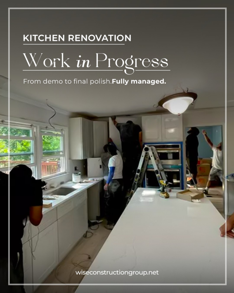 Kitchen renovation work in progress with crew installing cabinets at a project by Wise Construction Group in Atlanta, GA.