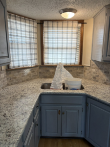 Newly installed kitchen sink and backsplash by Express Handyman Pros, LLC in Fort Smith, AR