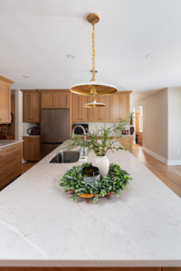 New kitchen sink, faucet, and pendant lights installed by Becker Home Improvement, Inc. in Cottage Grove, WI.