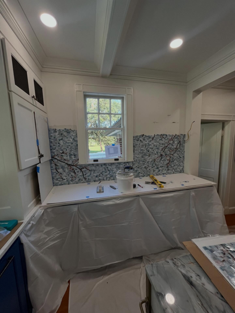 Kitchen tile backsplash installation in progress, showing meticulous work by Ayres Endeavors, LLC in New Orleans, LA.