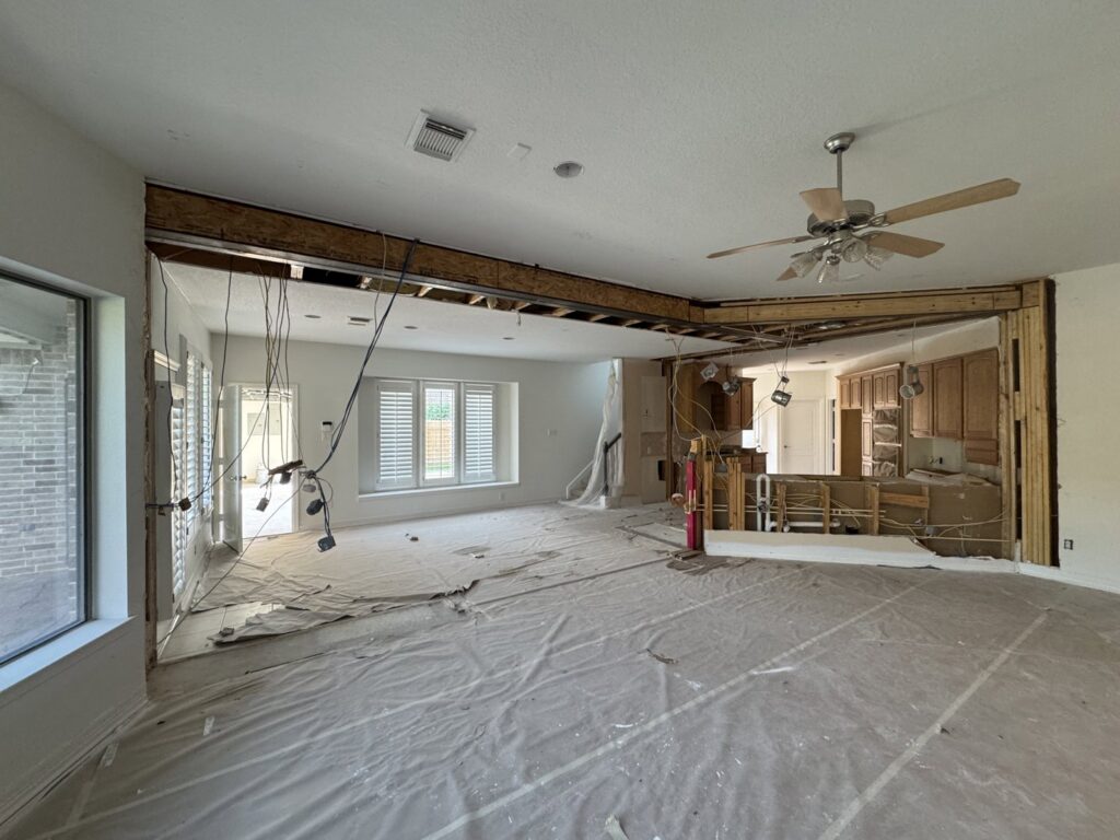 Kitchen wall removal and structural beam installation by Load Bearing Wall Pros in Plano, TX, creating an open space.