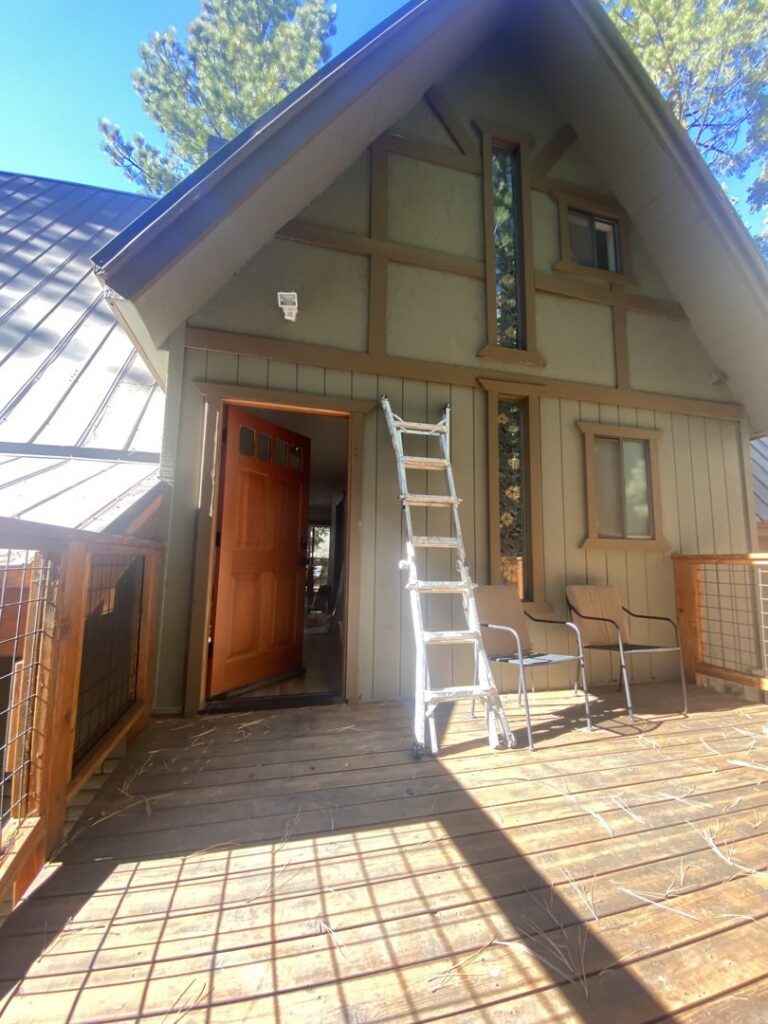 A ladder leaning against the exterior of a house, indicating outdoor maintenance or repair services by The Handy Nevadan LLC in Reno, NV.