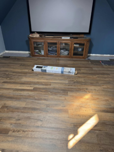 Laminate flooring installation in progress in a room, a service offered by Sanders Construction & Handyman Services, LLC in Oklahoma City, OK.