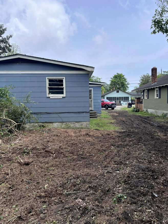 A residential area cleared of trees and debris by Clifford & Sons Tree Service in Mobile, AL