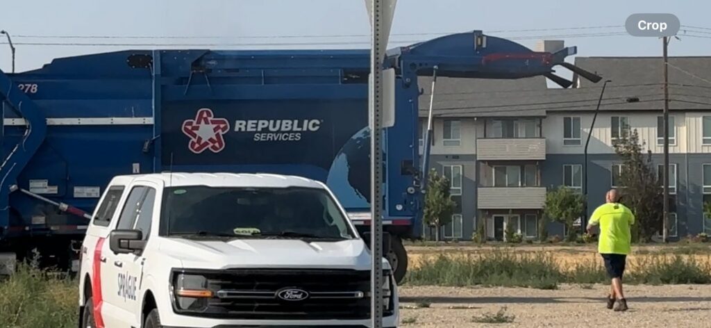 A notice sign indicating a rate increase at the ADA County Landfill, relevant to Benjamin's Rural Disposal services in Meridian, ID.