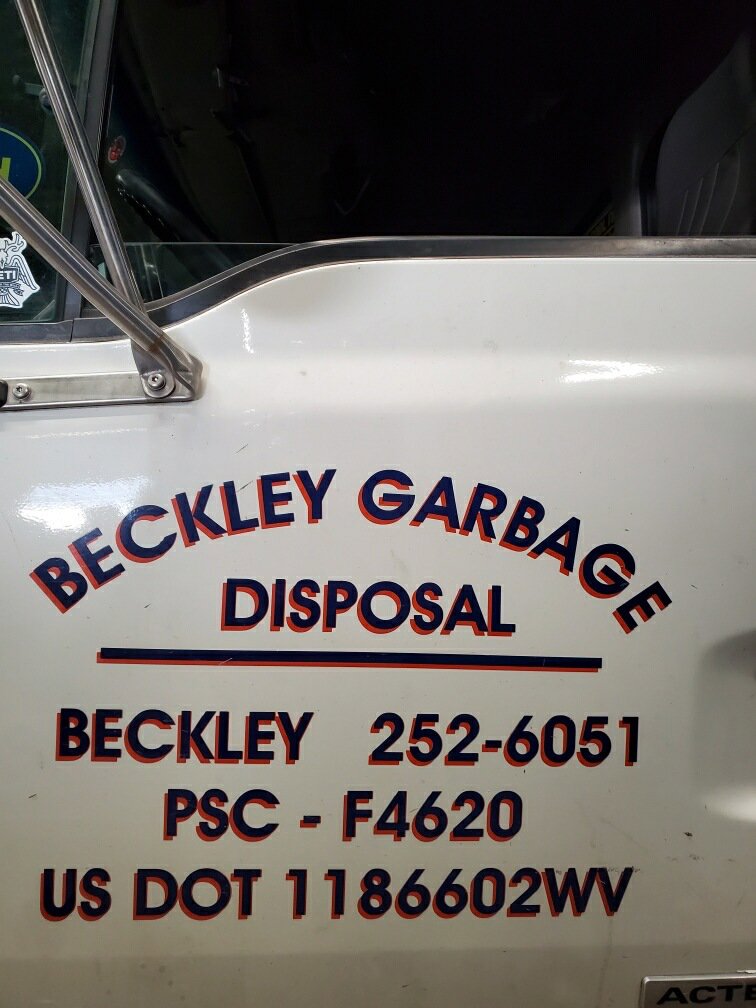 A large blue dumpster with the Whitecap Waste logo, ready for junk removal services in Beckley, WV.
