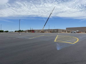 Extensive yellow parking lot striping for a large commercial property by Marine One Striping in Clarksville, TN.