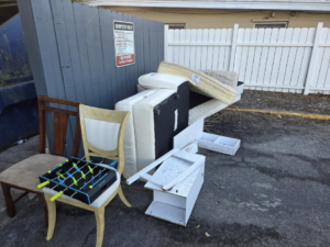 A large pile of old furniture and miscellaneous junk ready for removal by Westish Junk Removal LLC in Orlando, FL.