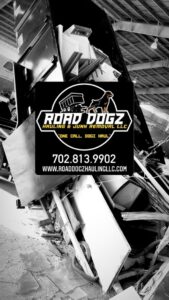 A large pile of various junk items, including old appliances and metal, ready for removal by Road Dogz Hauling in Las Vegas, NV.