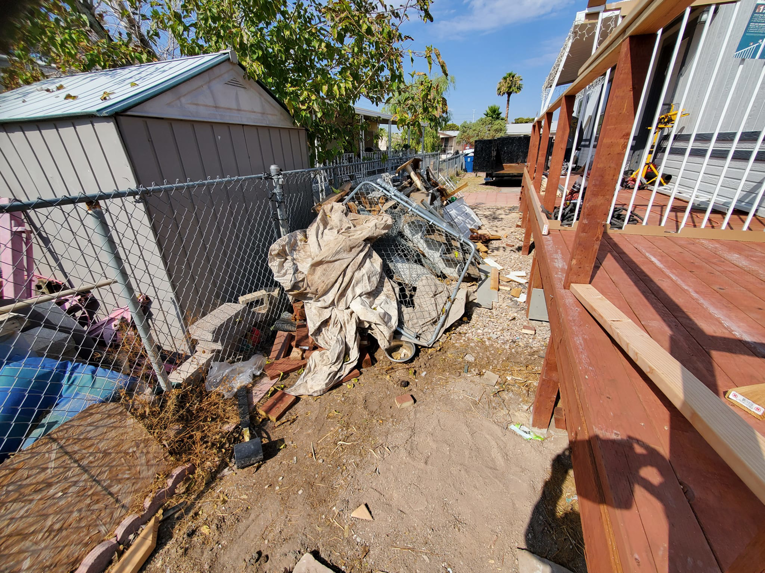 A large pile of mixed junk, including metal, fabric, and construction debris, ready for removal by V.S.C Junk Removal Services in Las Vegas, NV.