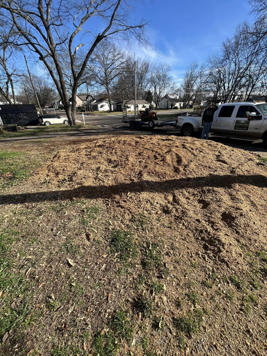 A large pile of fresh wood chips from tree removal by Dryad Tree Service in Huntsville, AL.