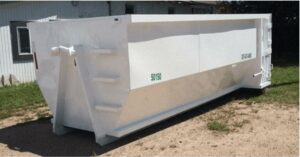 A large white roll-off dumpster, ready for junk removal or waste collection, provided by EM Enterprises, Inc. in Cheyenne, WY.
