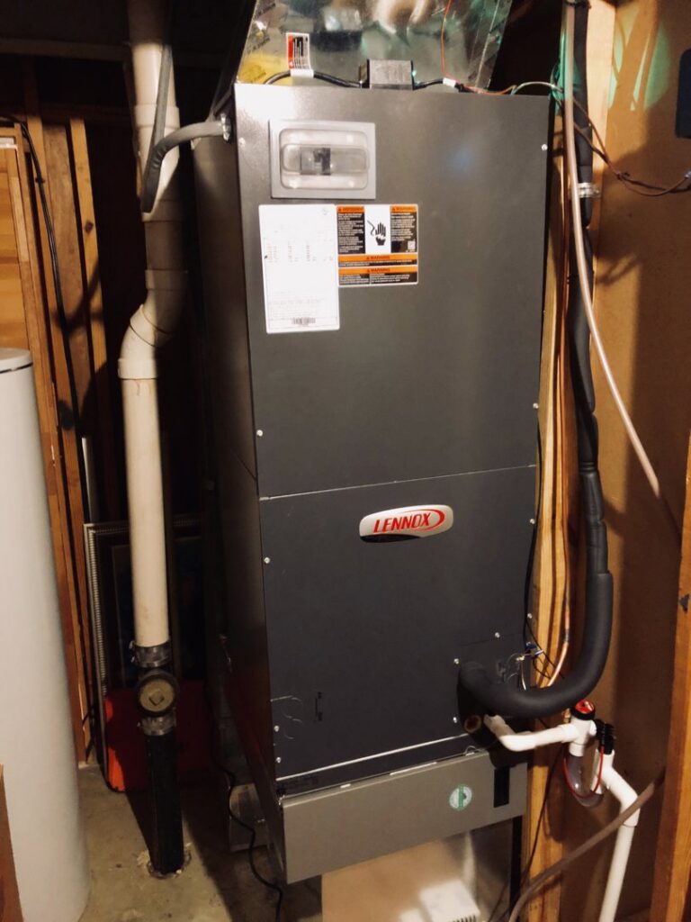 A Lennox furnace and air handler system installed in a utility space by Cold Comfort HVAC Services, LLC in Rockville, MD.