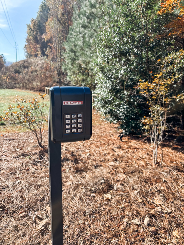 A LiftMaster gate keypad for access control installed by Swift Fencing Co. in Birmingham, AL.
