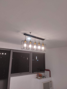 A linear pendant light fixture with multiple bulbs installed by Electrician on Call and Home Service in Taguig, PH.