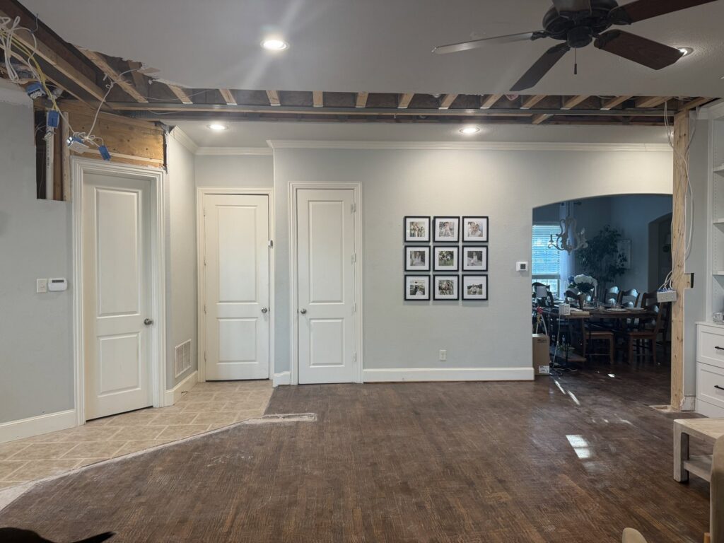 Living and dining room wall removal with new beam installation by Load Bearing Wall Pros in Plano, TX.