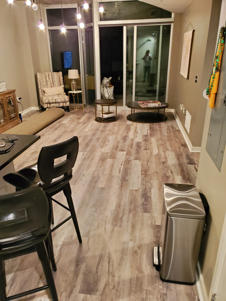 An interior view showcasing a recent flooring installation project in a living room by J & J Home Improvements, LLC in Franklin, TN.