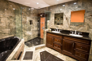 A luxurious bathroom renovation featuring a large shower and double vanity by Naugle Construction Company in Columbia, MO.