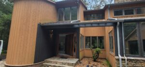 A luxurious bathroom remodel with a freestanding tub and white tiles by M J Services Home Remodeling in Gaithersburg, MD.