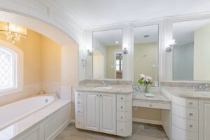 A luxurious bathroom remodel featuring a double vanity and large soaking tub by All Star Construction, Inc. in Houston, TX.