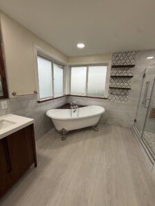 A luxurious, newly remodeled bathroom featuring a freestanding tub and a tiled walk-in shower by JP. Remodel Service LLC in Everett, WA.