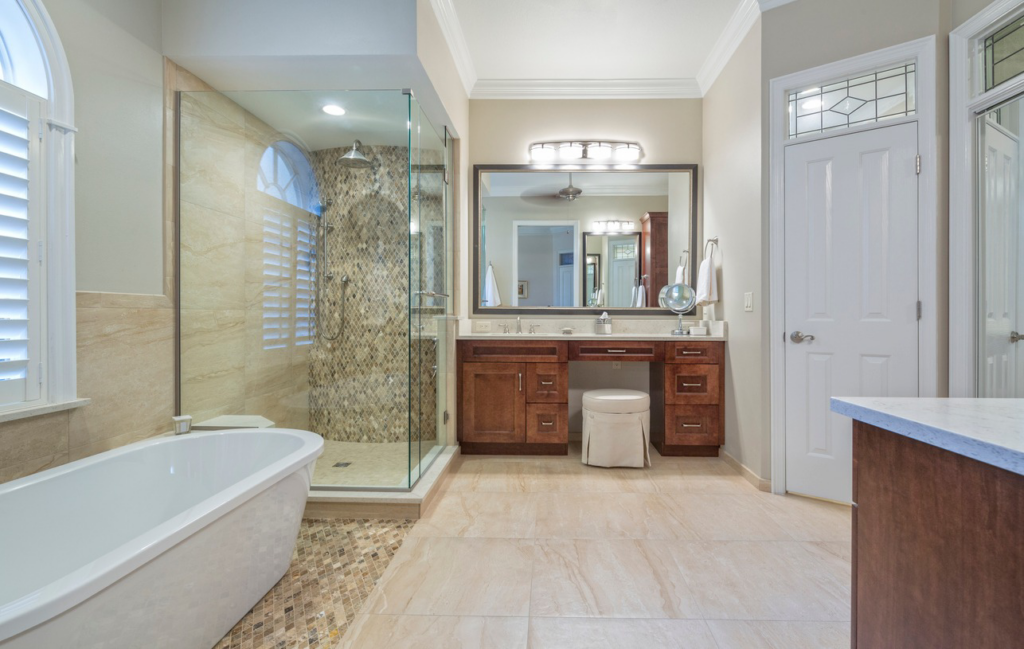 A luxurious bathroom renovation featuring a freestanding tub and large walk-in shower by D and R Professional Home Services in Services Available In.