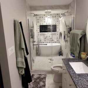 A luxurious bathroom renovation with a large shower and freestanding tub by Indy Renovation in Indianapolis, IN.