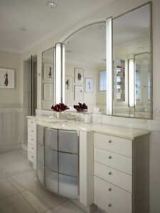 A luxurious bathroom vanity with custom mirrors and cabinetry, completed by S.N. Peck Builder, Inc. in Chicago, IL.