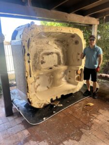 A Happy Hippo Junk Removal team member with a disassembled hot tub in Scottsdale, AZ.