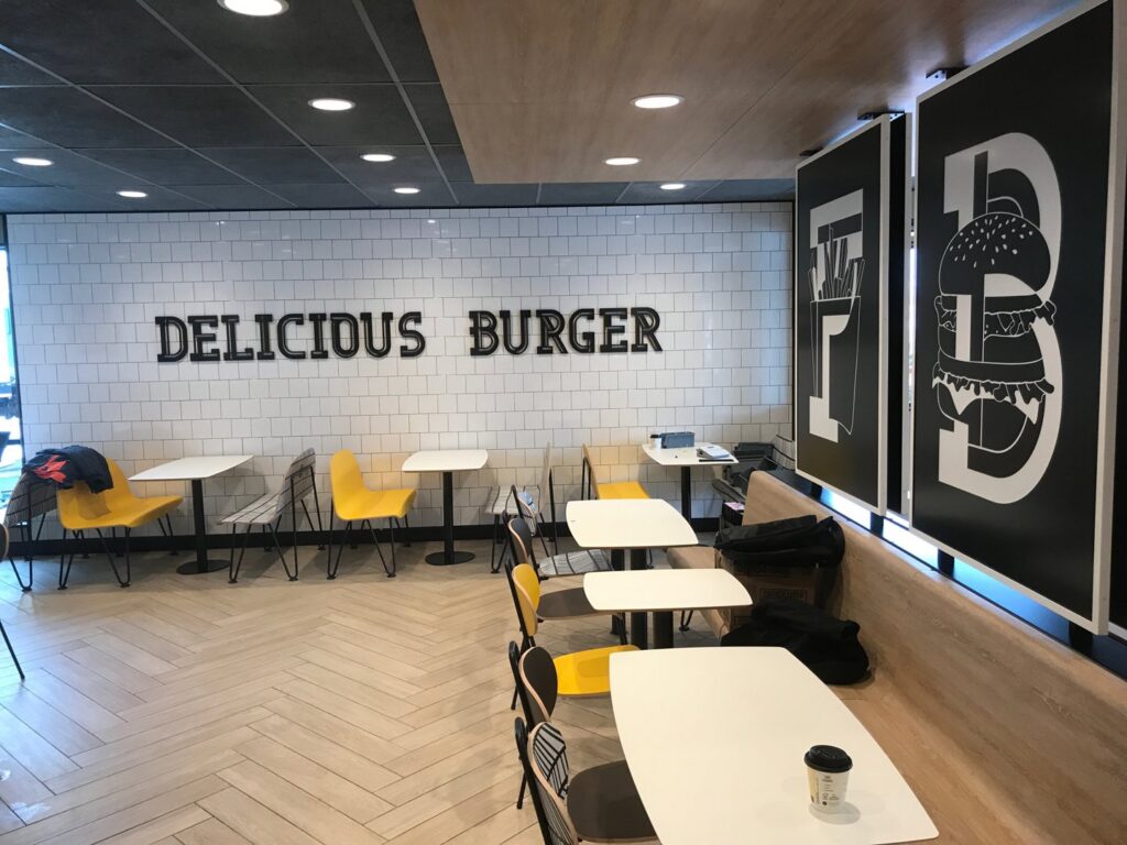 A completed McDonald's restaurant interior with dining area by GCM, INC. in Mount Joy, PA.