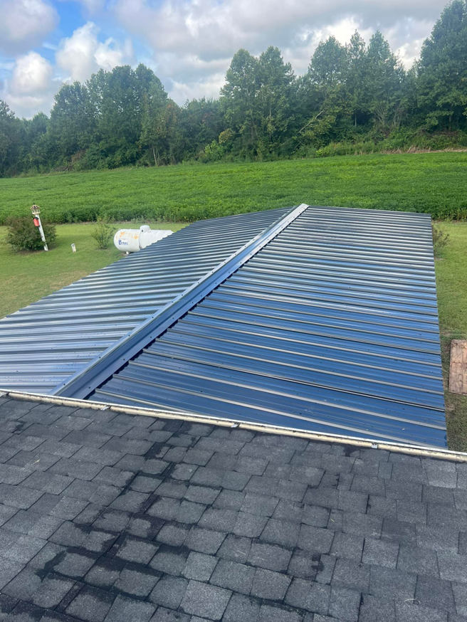 An overhead view of a newly installed metal roof carport or patio cover by Boyce Welding, LLC in Courtland, VA.