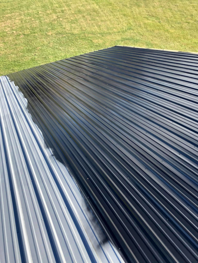 Before and after view of metal roof cleaning and painting by Extreme Precision Painting in Elizabethtown, KY.