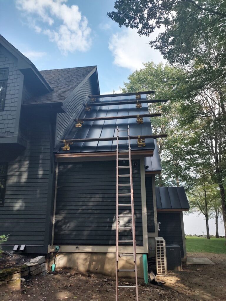 Metal roof installation in progress on a residential home by JB Home Improvement Services in Sanford, FL.
