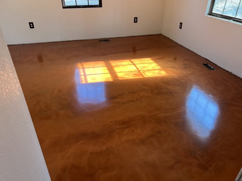 A stunning metallic epoxy floor coating, a specialized handyman service by Egli Coating Solutions in Evansville, IN.