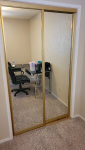 Installation of new mirrored sliding closet doors in a bedroom by My Quality Handyman in Fresno, CA.