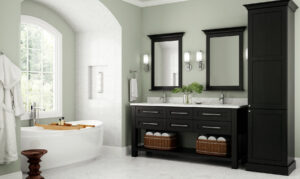 A modern bathroom with a freestanding tub and dark double vanity, demonstrating renovation services by Paradise Found Construction in Cary, NC.