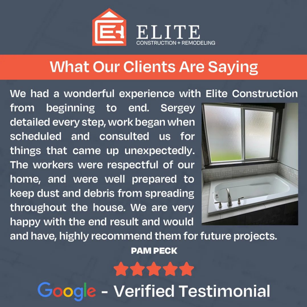 A modern bathroom remodel featuring a sleek bathtub and window completed by Elite Construction + Remodeling in Spokane, WA.