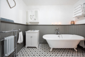 A beautifully renovated modern bathroom, showcasing potential renovation services by B&S Home Improvement in Evansville, IN.