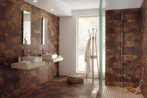 A modern bathroom renovation featuring tiled walls, floating sinks, and a walk-in shower by Cliff's Construction in Richmond, VA.