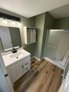 Modern bathroom renovation with new vanity and shower by Panhandle Contracting Co. in Rathdrum, ID
