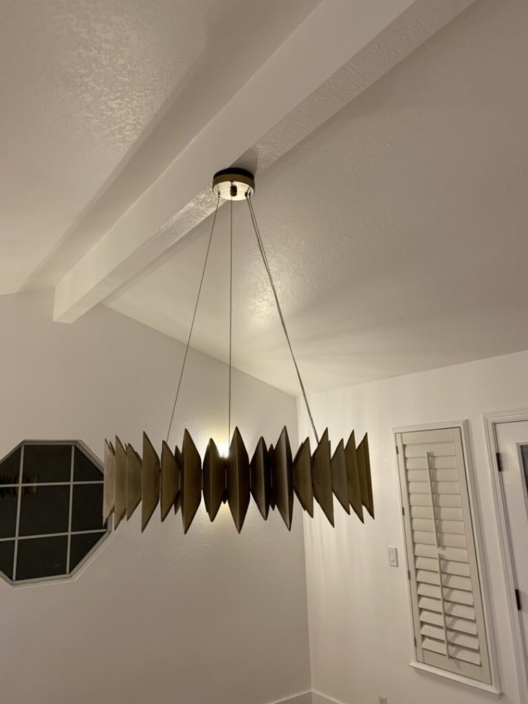 A modern chandelier newly installed by Kennyman The Handyman Inc. in San Francisco, CA